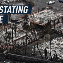 Aerial shot shows the town of Lahaina in Maui completely obliterated by the wildfires. Palm trees have been destroyed and houses have been burned to the ground. Caption reads: "Devastating blaze."