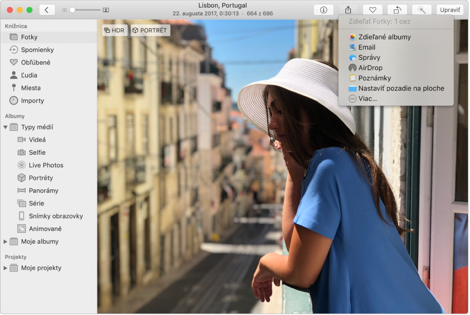 Zobrazí sa okno Fotky zobrazujúce fotografiu a ponuku Zdieľať s príkazom Zdieľané Albumy.