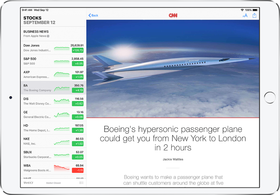 A Stocks screen in landscape orientation. The watchlist is on the left side of the screen. To the right of the watchlist is a business news story. Above the news story, from left to right, are the Back, Appearance, and Share buttons.