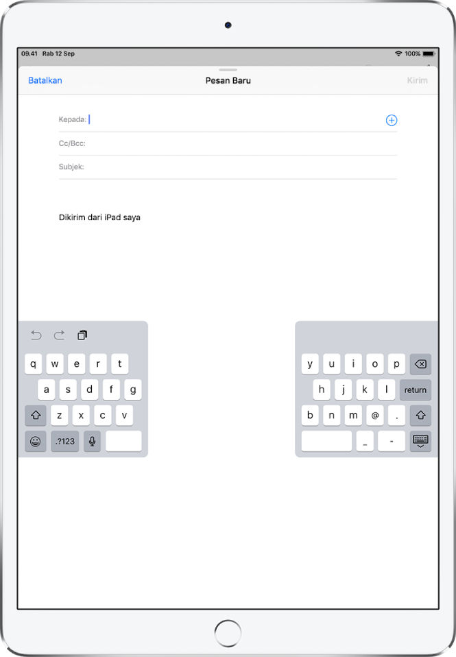 Papan ketik terbagi dilepas dan di bagian tengah layar iPad.