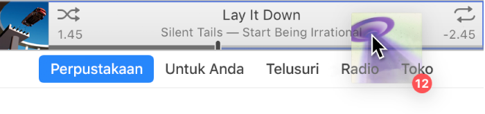 Album sedang diseret ke bagian atas jendela iTunes.