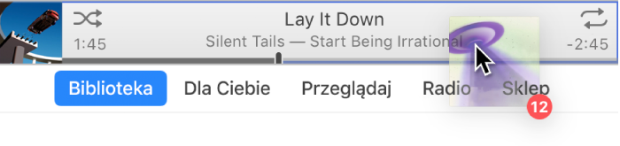 Album przeciągany na górę okna iTunes