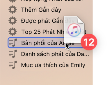Album đang được kéo vào playlist. Playlist được tô sáng bằng hình chữ nhật màu lam.