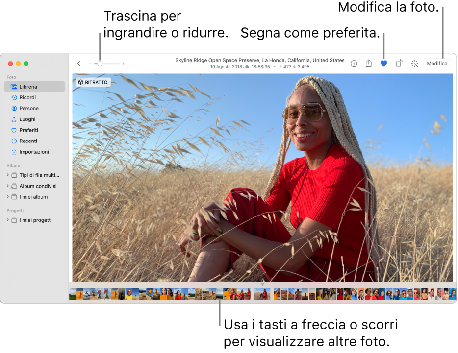 La finestra di Foto con una foto ingrandita sulla destra e una riga di miniature sotto. La barra strumenti nella parte superiore include il cursore Zoom, il pulsante Preferito e il pulsante Modifica.