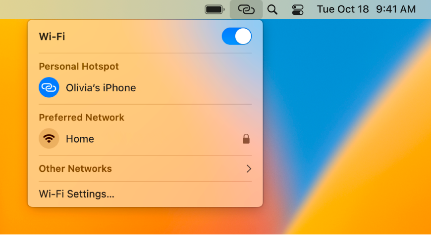 A Mac screen with the Wi-Fi menu showing a Personal Hotspot connected to an iPhone.