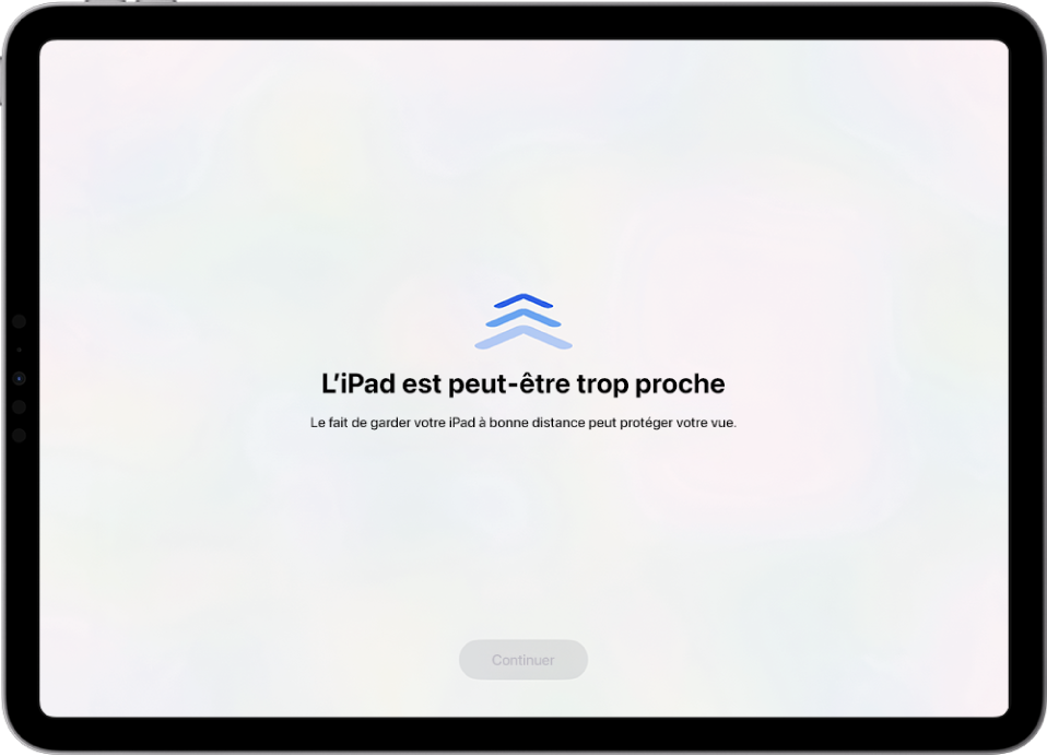 Un écran avec un avertissement indiquant que l’iPad est trop près et une suggestion de tenir l’iPad à distance. Lorsque l’iPad est reculé, le bouton Continuer s’affiche en bas de l’écran, vous permettant de revenir à l’écran précédent.