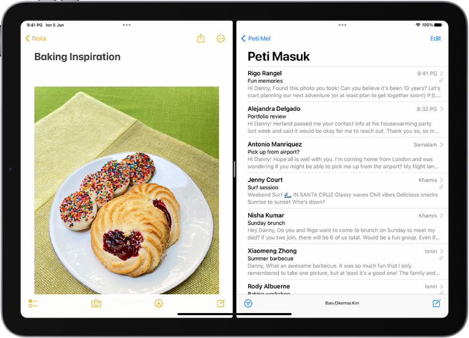 App Nota dibuka di sebelah kiri skrin dan Mail dibuka di sebelah kanan. Di antara app ialah pemisah yang digunakan untuk mensaiz semula pisahan.