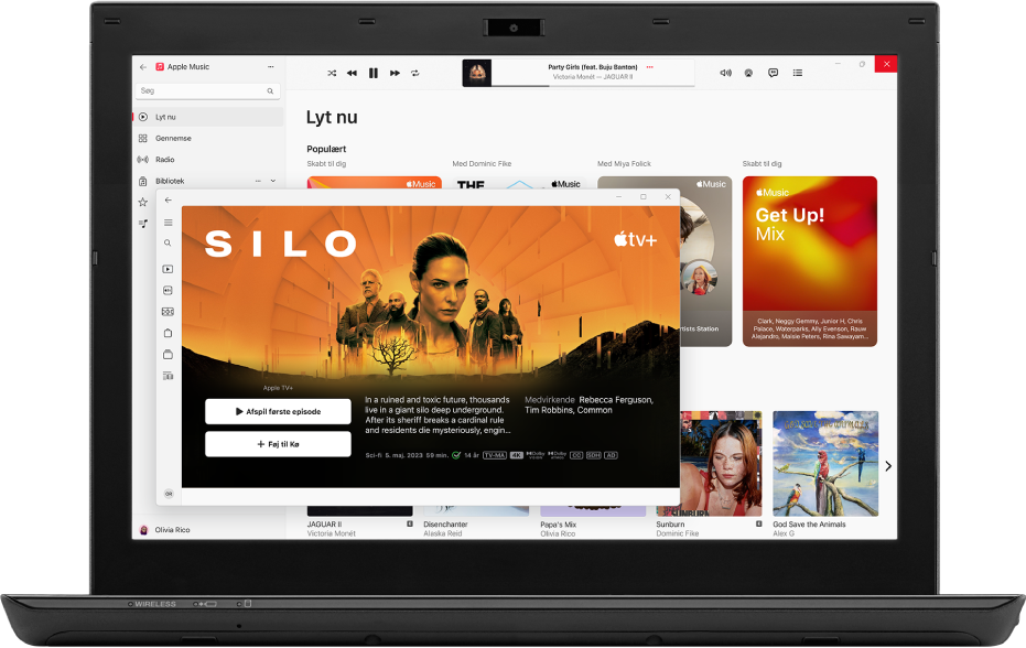 En pc, hvor Apple TV-appen og Apple Music er åbne.