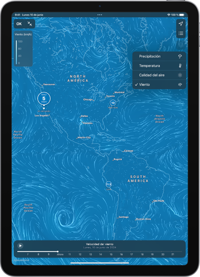 Un mapa de temperaturas del área circundante ocupa toda la pantalla del iPad. En la esquina superior derecha, de arriba abajo, aparecen los botones “Ubicación actual” y “Ubicaciones favoritas”. El menú de superposición está abierto con la opción Viento seleccionada. En la parte inferior hay una línea de tiempo. El botón “Activar/desactivar mapa a pantalla completa” y “Escala de la superposición del mapa” están en la esquina superior izquierda.