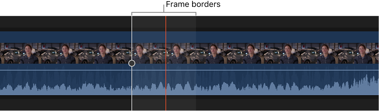 A clip in the timeline zoomed in to show the audio waveform within the borders of a video frame