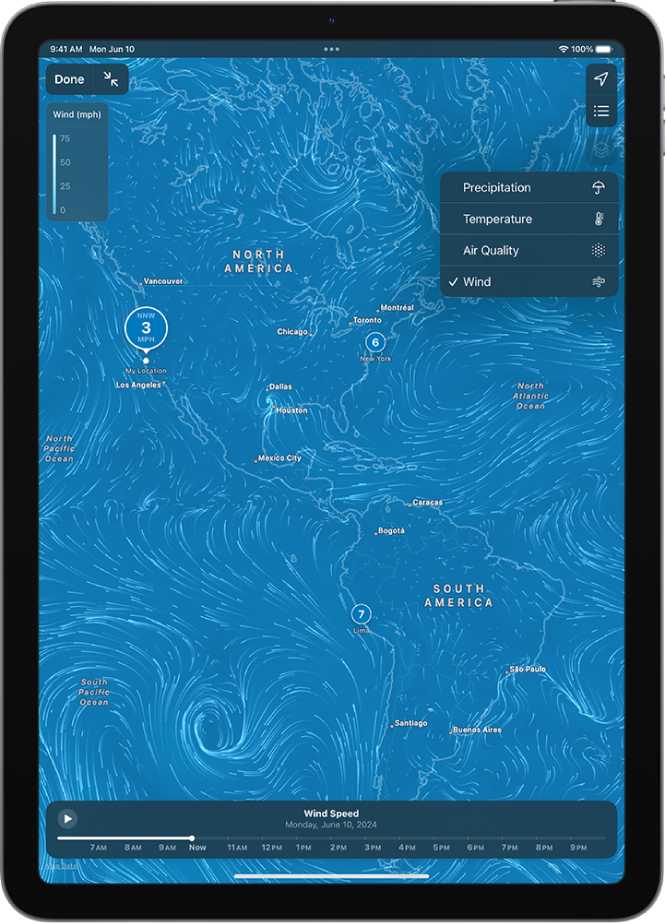 A temperature map of the surrounding area fills the iPad screen. In the top-right corner, from top to bottom, are the Current Location and Favorite Locations buttons. The Overlay Menu is open, and Wind is selected. Along the bottom is a timeline. The Toggle Full Screen Map button and the Wind Map Overlay Scale are in the top-left corner.