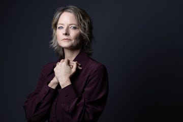 jodie foster looking ahead for a portrait photo and clasping her hands