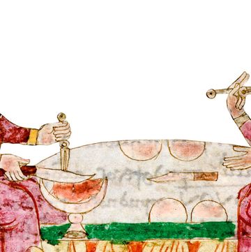 een middeleeuwse koning eet met een vork, miniatuur van hrabanus maurus
