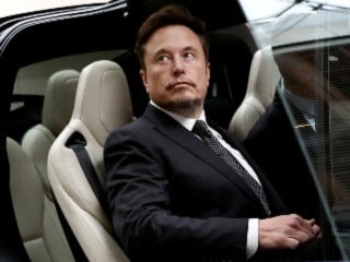 Elon Musk, Tesla Win Dismissal of Lawsuit Over Alleged Dogecoin Manipulation