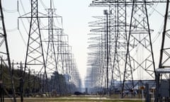 FILE - This Tuesday, Feb. 16, 2021 file photo shows power lines in Houston. The electric power grid manager for most of Texas has issued its first conservation alert of the summer, calling on users to dial back energy consumption to avert an emergency. The Energy Reliability Council of Texas issued the alert shortly after midday Monday, saying many forced generation outages and potential record June demand is squeezing the power supply. (AP Photo/David J. Phillip)