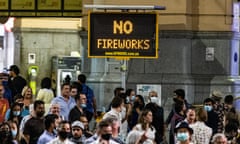 A 'no fireworks' sign in front of Flinders Street station
