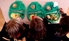 Children eating school lunch