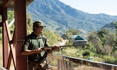 Sunglingthanhg, aged 63, keeps an eye on the village of Haimual from his post.