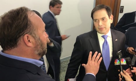 'Don't touch me': Marco Rubio and Alex Jones clash – video