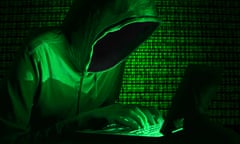 Green Binary Hacker<br>faceless computer hacker, green binary code background.