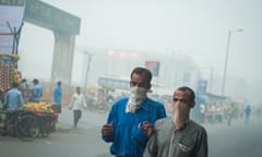 Two men with mouth covered with cloth in Delhi