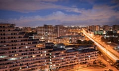 Naples, Italy - View of Le Vele (sails) in Scampia district in the outskirts of the city of Naples. These buildings, typical example of popular architecture, were built during the 60’s. Scampia and le vele have been associated and are still today associated (wrongly) to the criminal wars and the drug market (camorra is the local mafia). Something has begun to change in the last years: occupiers of le vele have been moved to new houses provided by the local administration, the subway station connects Scampia with downtown Naples, a department of Federico II university is being built and many associations are trying to help the local people. In the next years three of the four Sails will be destroyed. Only one will remain and be requalified.