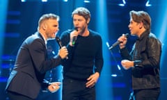 The Graham Norton Show - London<br>Take That (left to right) Gary Barlow, Howard Donald and Mark Owen during filming of the Graham Norton Show at the London Studios, in central London. PRESS ASSOCIATION Photo. Picture date: Tuesday November 25, 2014. The programme is due to be transmitted on November 28. Photo credit should read: Dominic Lipinski/PA Wire