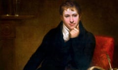 Sir Humphry Davy sitting on a red chair with his left hand close to his chin