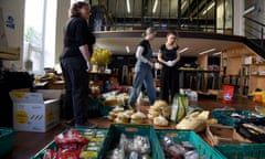 Volunteers from a mutual aid group in Islington, north London, preparing food parcels for members of their community