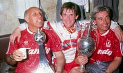 Liverpool in happier times: Kenny Dalglish with Ronnie Moran and Roy Evans after winning the league in 1990.