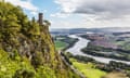 A tower on a rocky outcrop, with the river snaking into the distance.