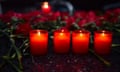 Flowers and candles in front of the Reina nightclub.