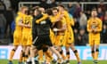 Cambridge players celebrate their win over Newcastle United