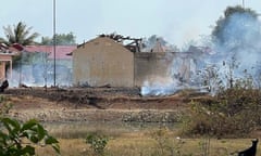 Smoke billows from a warehouse after an explosion at an army base in Kampong Speu province, Cambodia.