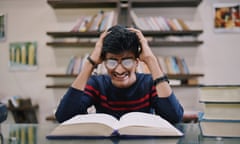 Judging by his expression, he should have thrown that book several hundred pages ago.