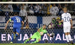 Italy’s Jorginho (out of picture) slots his penalty home for the winner against Finland.