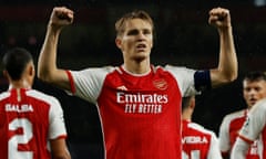 Arsenal's Martin Odegaard celebrates after scoring their fourth goal during the UEFA Champions League match between Arsenal FC and PSV Eindhoven at Emirates Stadium.