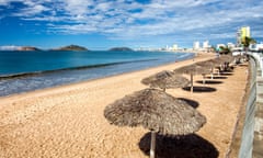 Palapas line the boardwalk in the Pacific resort city of Mazatlan, Sinaloa, Mexico.