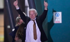 WikiLeaks founder Julian Assange gestures after landing in Canberra, Australia.