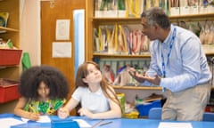 Bayleigh Gomez-Blake, 10, Evelina Brahasani, 11, take part in one of Muhammad Ali’s tutoring sessions at a north London school.