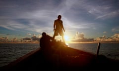 A boat crew during a trip to check on the wreck of what is believed to be a 17th century Dutch East India Company (VOC) ship in Mentawai Islands, Indonesia. 