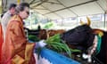 Royal visit to Sri Lanka - Day three<br>PABest The Princess Royal and her husband Vice Admiral Sir Timothy Laurence feed cattle, sacred to Hindus, prior to departing Vajira Pillayar Kovil Hindu temple in Colombo, Sri Lanka, as part of day three of their visit to mark 75 years of diplomatic relations between the UK and Sri Lanka. Picture date: Friday January 12, 2024. PA Photo. See PA story ROYAL Anne. Photo credit should read: Jonathan Brady/PA Wire