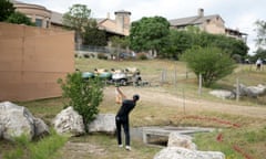 Jordan Spieth plays from a penalty area at the Texas Open