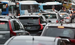 Cars and buses sit in traffic on Military Road during the morning commute in Sydney