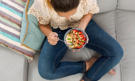 Woman with a breakfast bowl