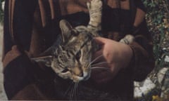 Tachypuss the cat in Fanny Johnstone’s arms.