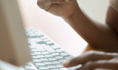 Close up of hands holding credit card and typing on keyboard<br>A434J8 Close up of hands holding credit card and typing on keyboard