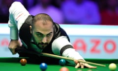 Hossein Vafaei lines up a shot during his 6-2 victory over Mark Selby.