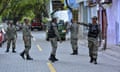 Maldives national defence force personnel patrol the streets