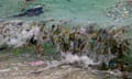 Plastic waste and other rubbish washes up on a beach in Koh Samui in the Gulf of Thailand